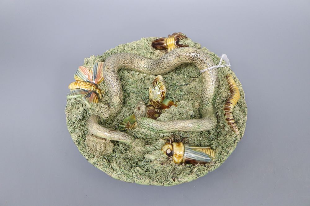 A Palissy style dish, decorated with reptiles and insects